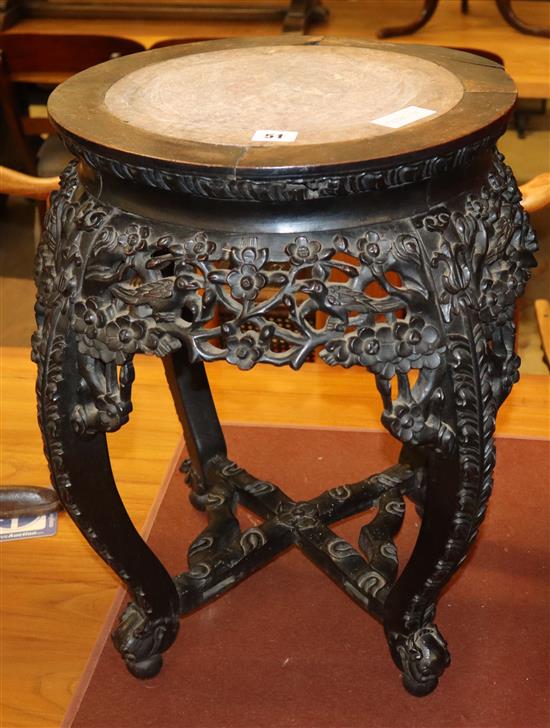 A 19th century Chinese marble topped carved hardwood jardiniere stand, diameter 44cm, H.53cm